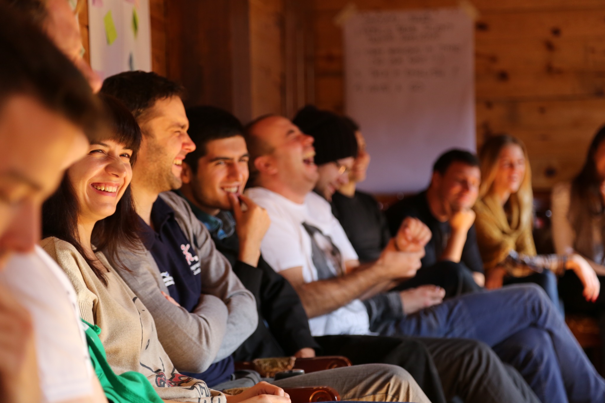 A group of young adults enjoying a learning session together